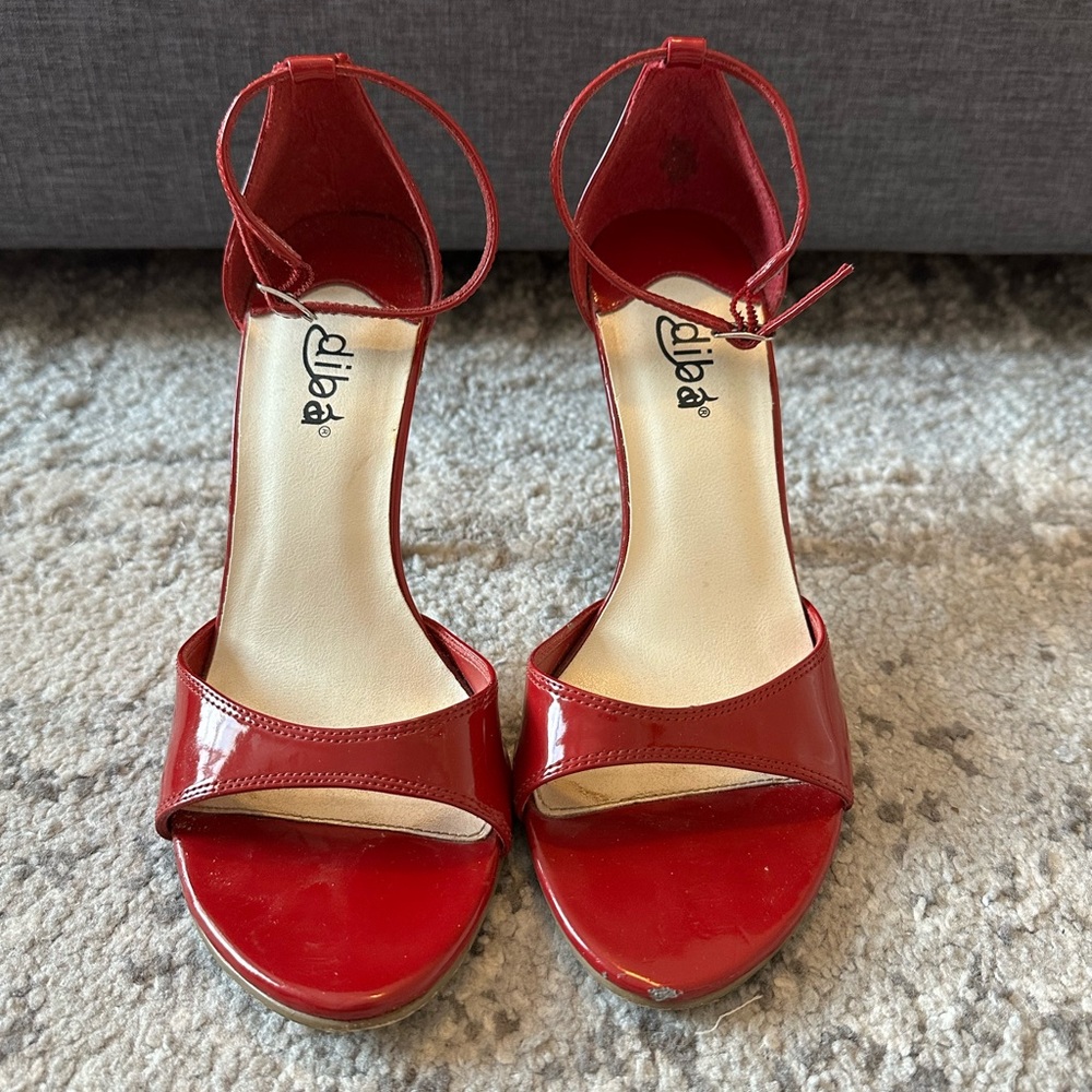 Maroon high heel shoes w/ ankle strap.   Size 7 1/2.